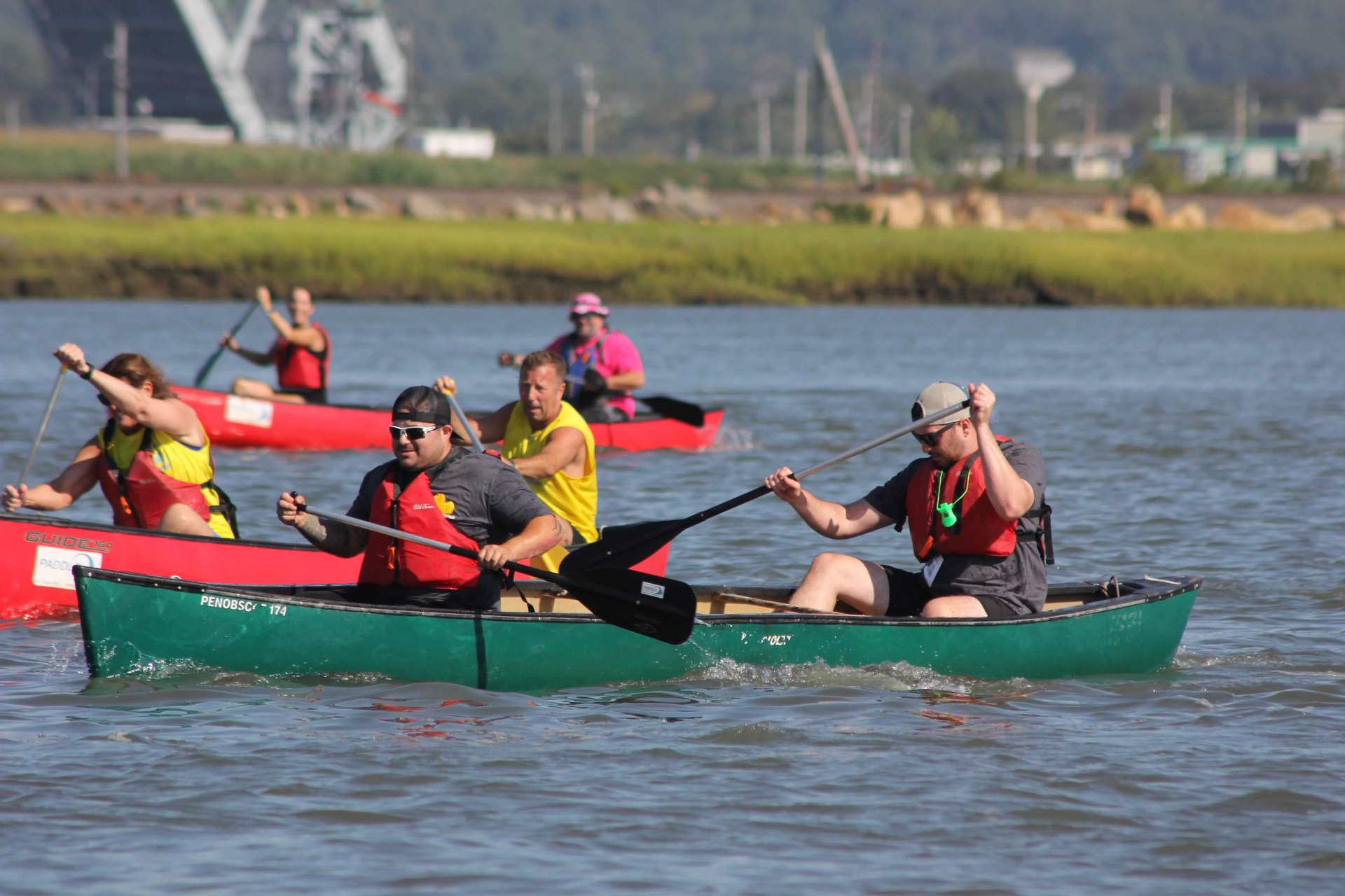 Racers paddling together on the Pines River