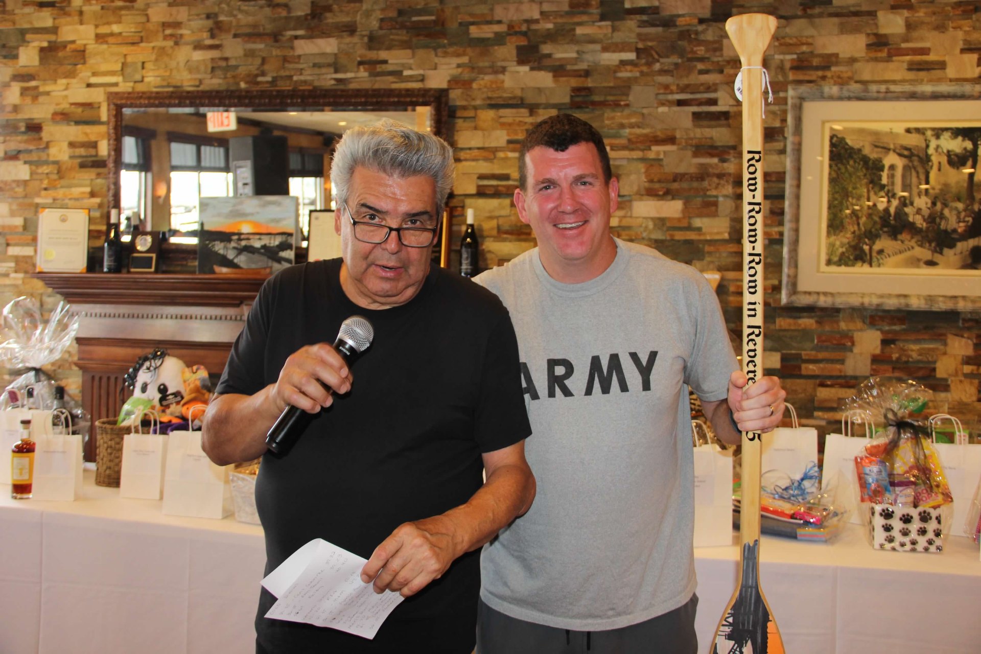 Announcer with engraved race paddle